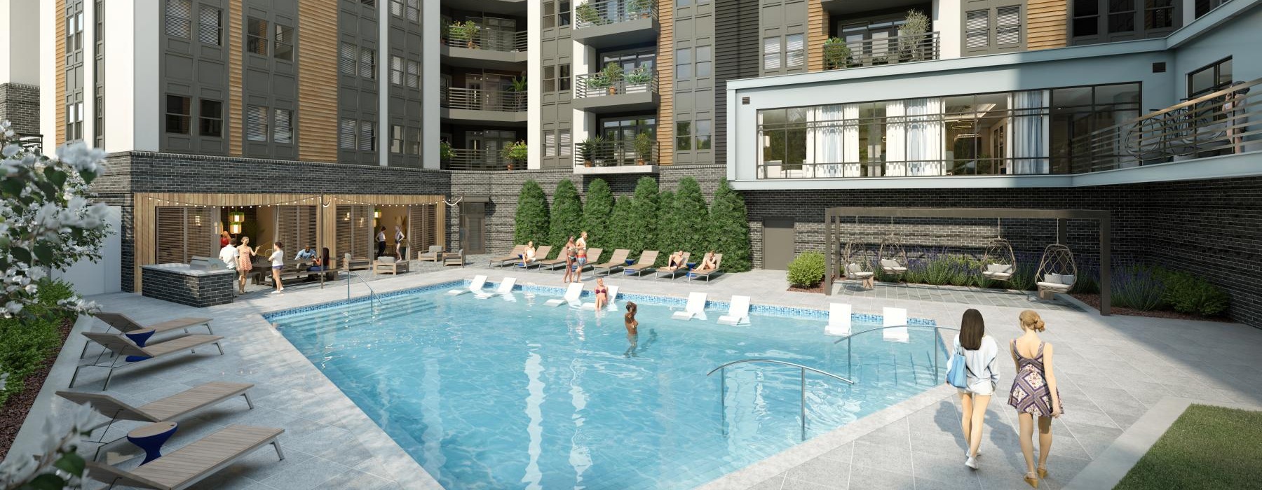 a pool in a courtyard with people in it and buildings in the background